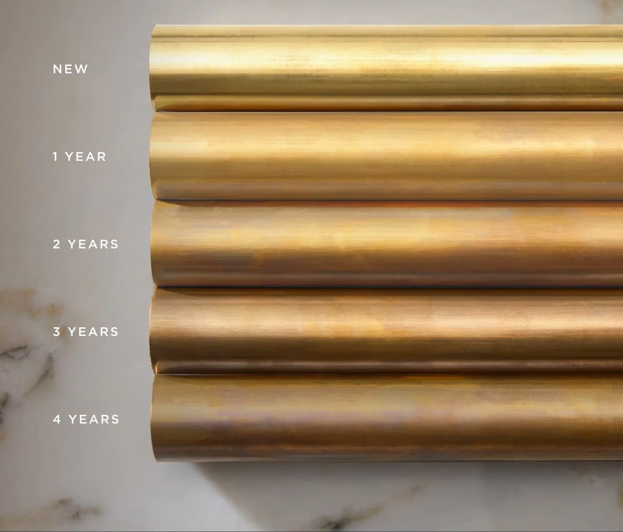 Solid brass aging from bright gold to a warm antique bronze patina over four years